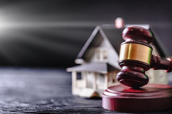gavel and mini house